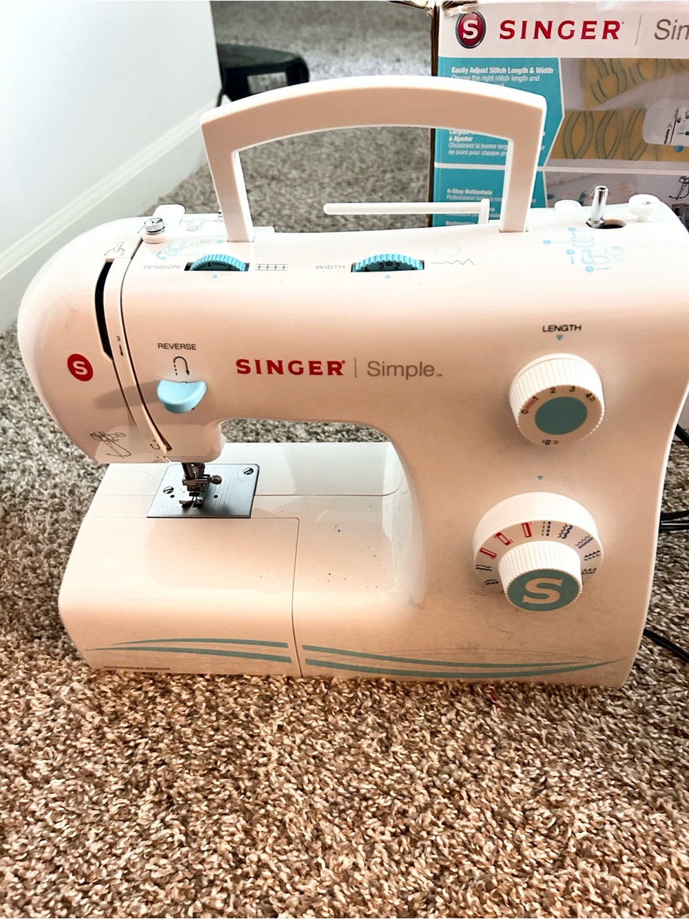 Singer Simple White and Teal Portable Sewing Machine